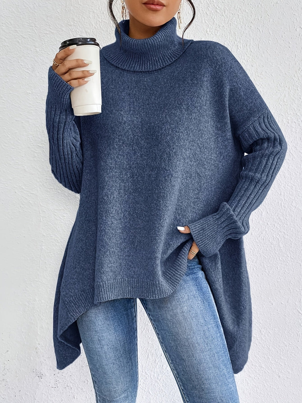 Dark blue knit turtleneck sweater with asymmetrical high-low hem and long sleeves