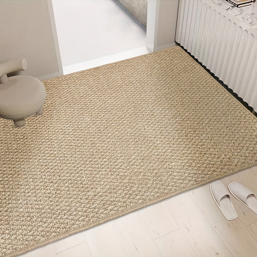 Beige jute-look entry doormat with textured surface and non-slip backing.