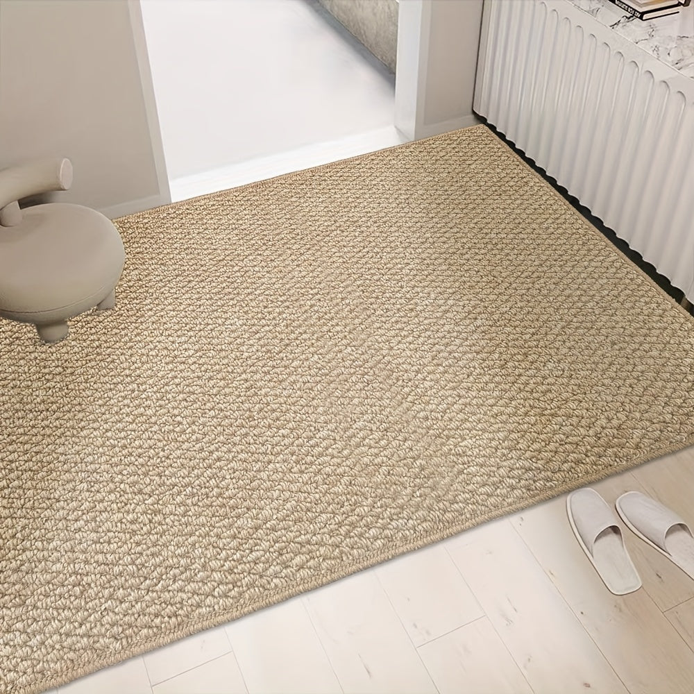 Beige jute-look entry rug with textured weave and non-slip backing.