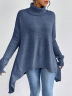 Women's loose turtleneck sweater in slate blue, long sleeves, ribbed cuffs, asym hem