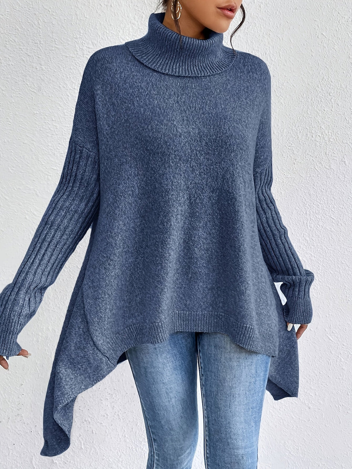 Women's loose turtleneck sweater in slate blue, long sleeves, ribbed cuffs, asym hem