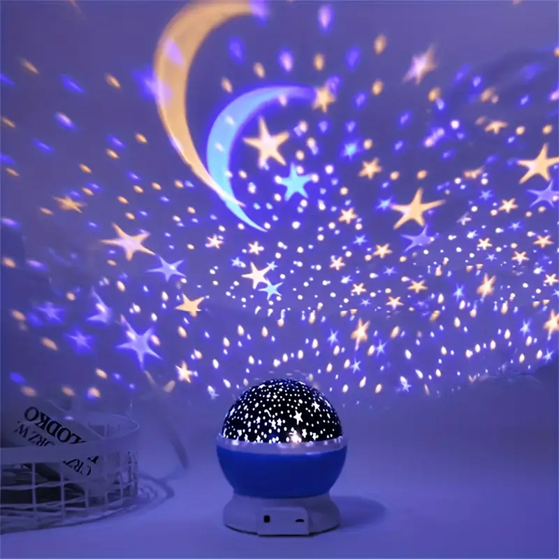 Compact starry sky night light with black star dome and blue base