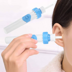 Ear cleaning suction tool with blue ring and white tube held near ear