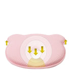 Pink contoured baby head support pillow with cushioned head channel and face cutout