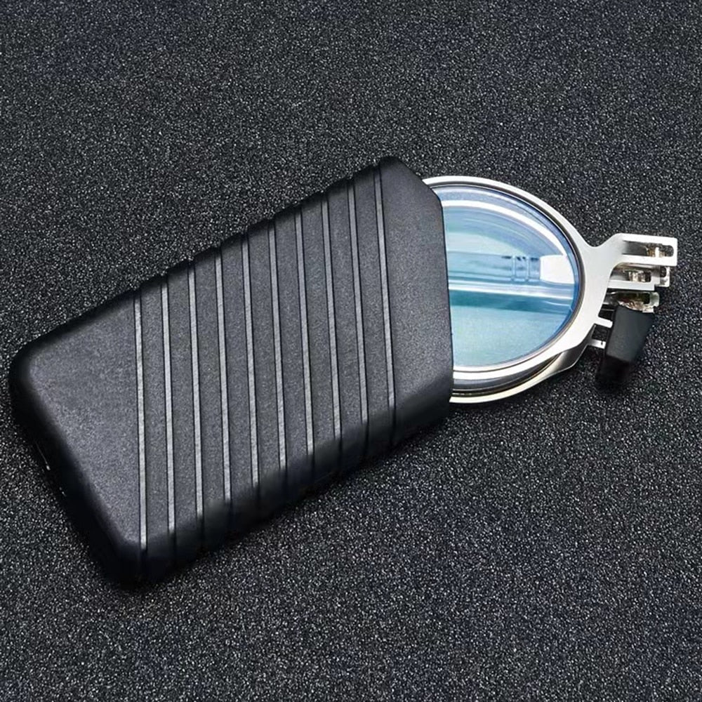 Round metal folding reading glasses with black ridged protective carrying case