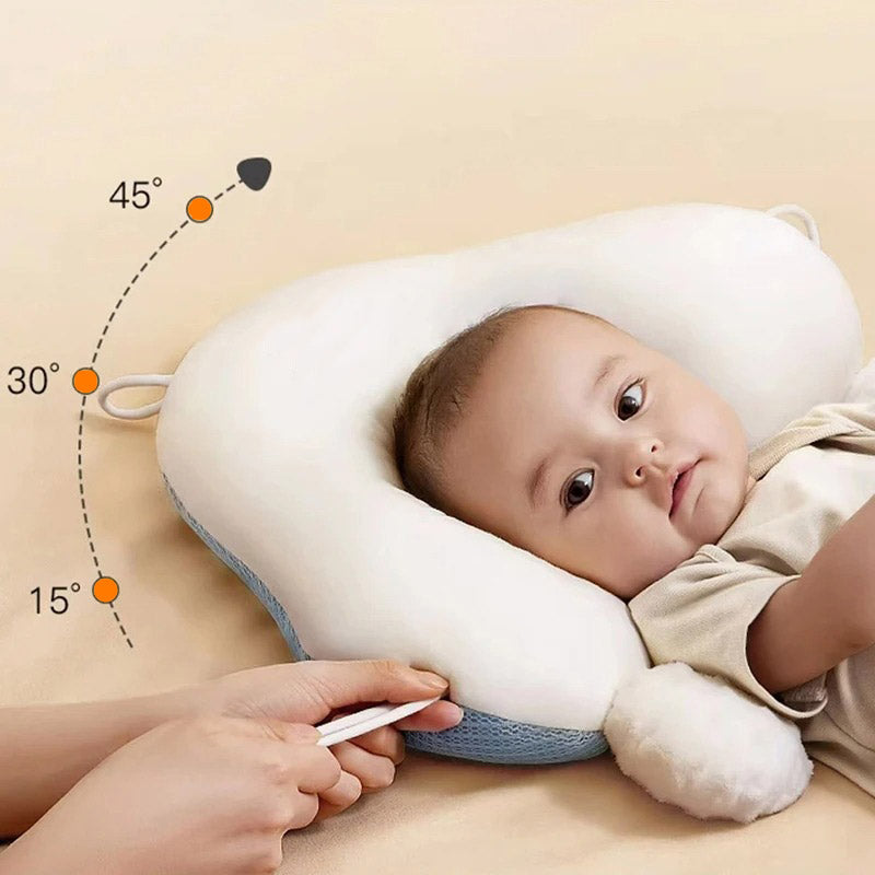 White baby cushion with support angle marks and a baby lying reclined