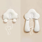 White ergonomic baby cushion with adjustable strap system shown