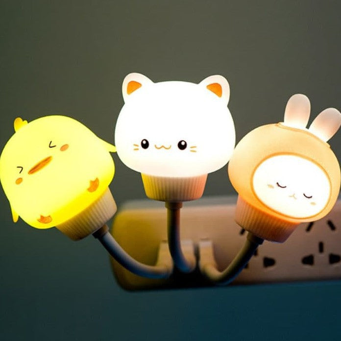 Silicone animal night light set with cat, chick, and bunny cups, warm glow