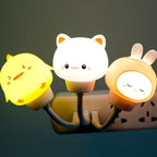 Silicone animal night light set with cat, chick, and bunny cups, warm glow