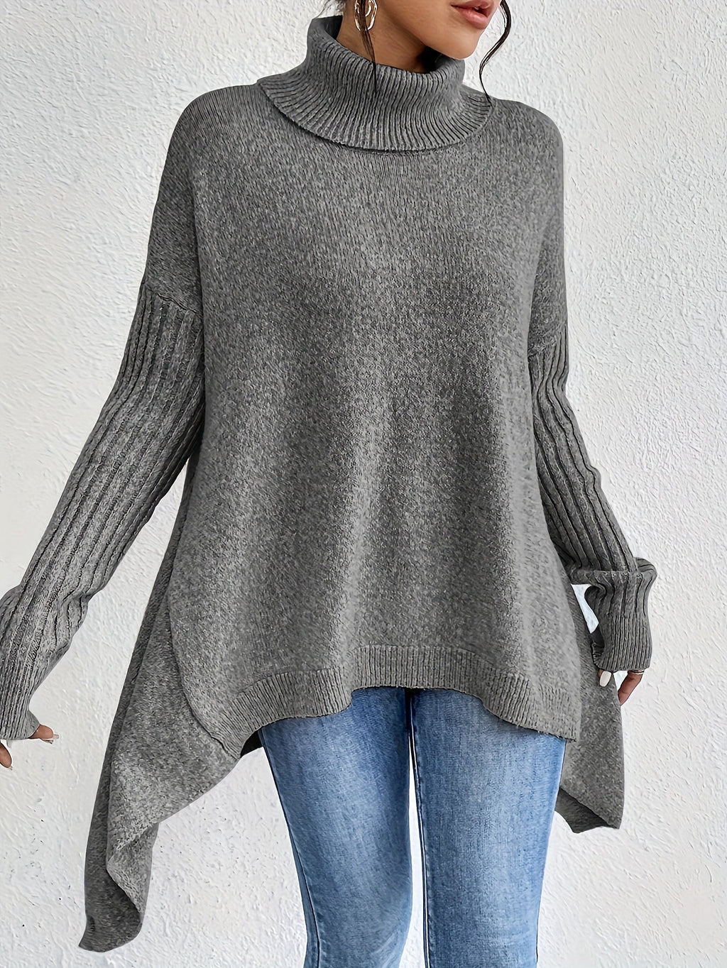 Women's loose turtleneck sweater in heather gray, long sleeves, ribbed cuffs, asym hem