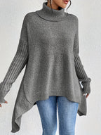 Women's loose turtleneck sweater in heather gray, long sleeves, ribbed cuffs, asym hem