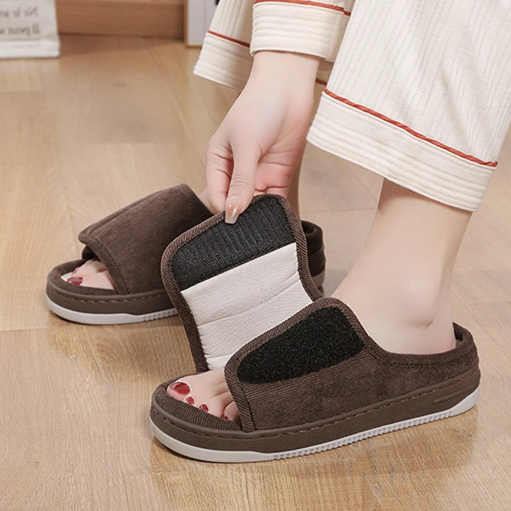 Brown wide open-toe house slippers with adjustable strap, shown on foot