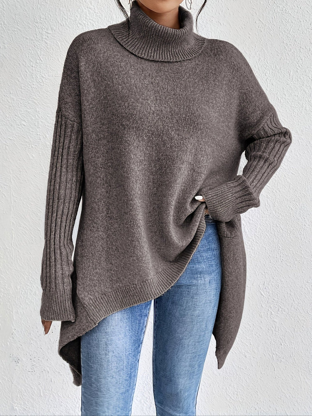 Women's loose turtleneck sweater in dark gray, long sleeves, ribbed cuffs, asym hem