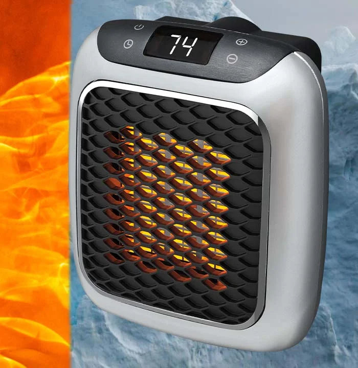 Portable electric heater close-up showing glowing grille and front control panel