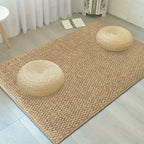 Beige jute-look doormat with looped texture and squared corners.