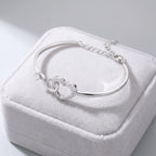 Novara | Infinity Heart Bracelet for Women - Crystal Interlocking Elegant Fit-bracelet-Silver-Camoufit