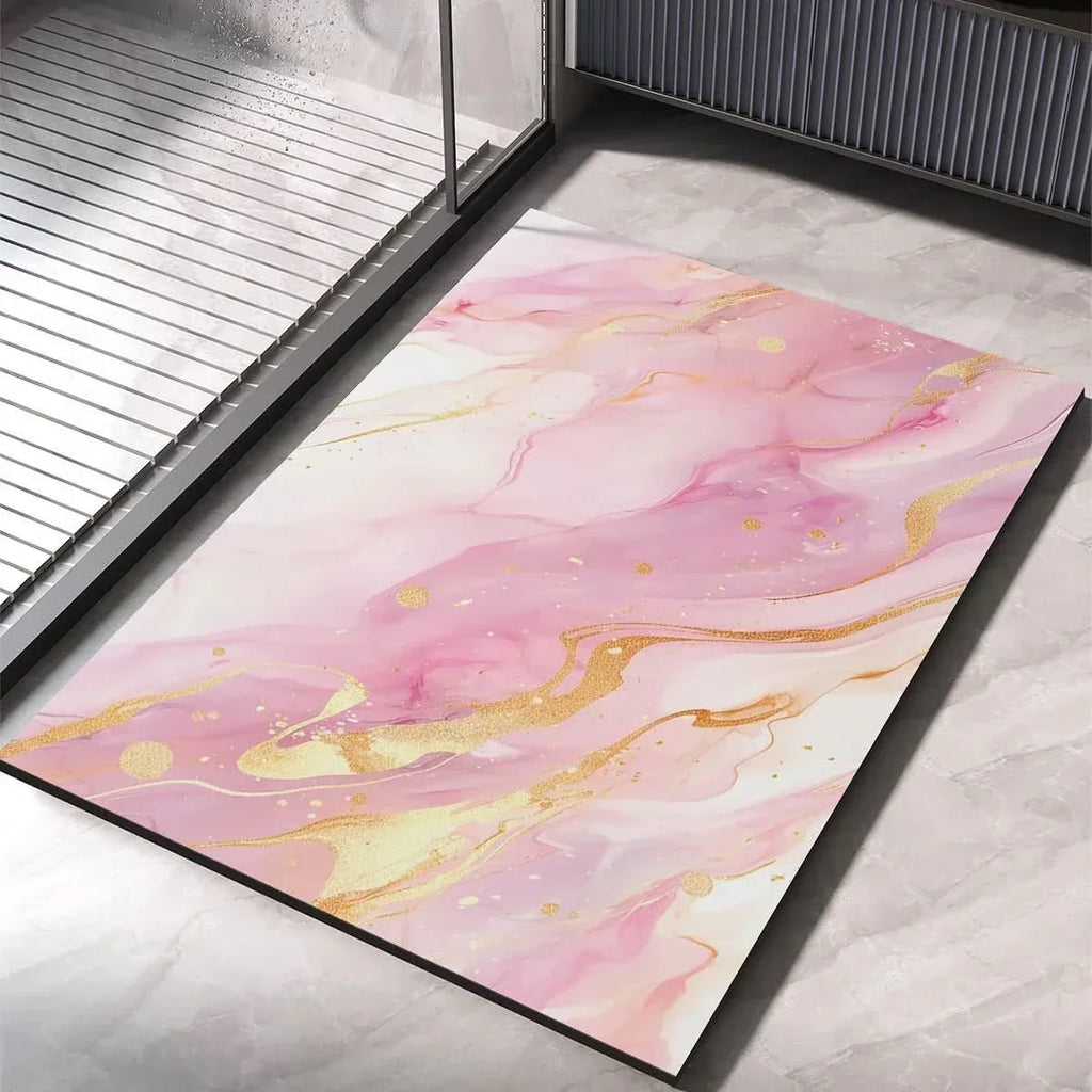Pink shower bath mat with soft marble swirls and gold speckles, non-slip quick-dry