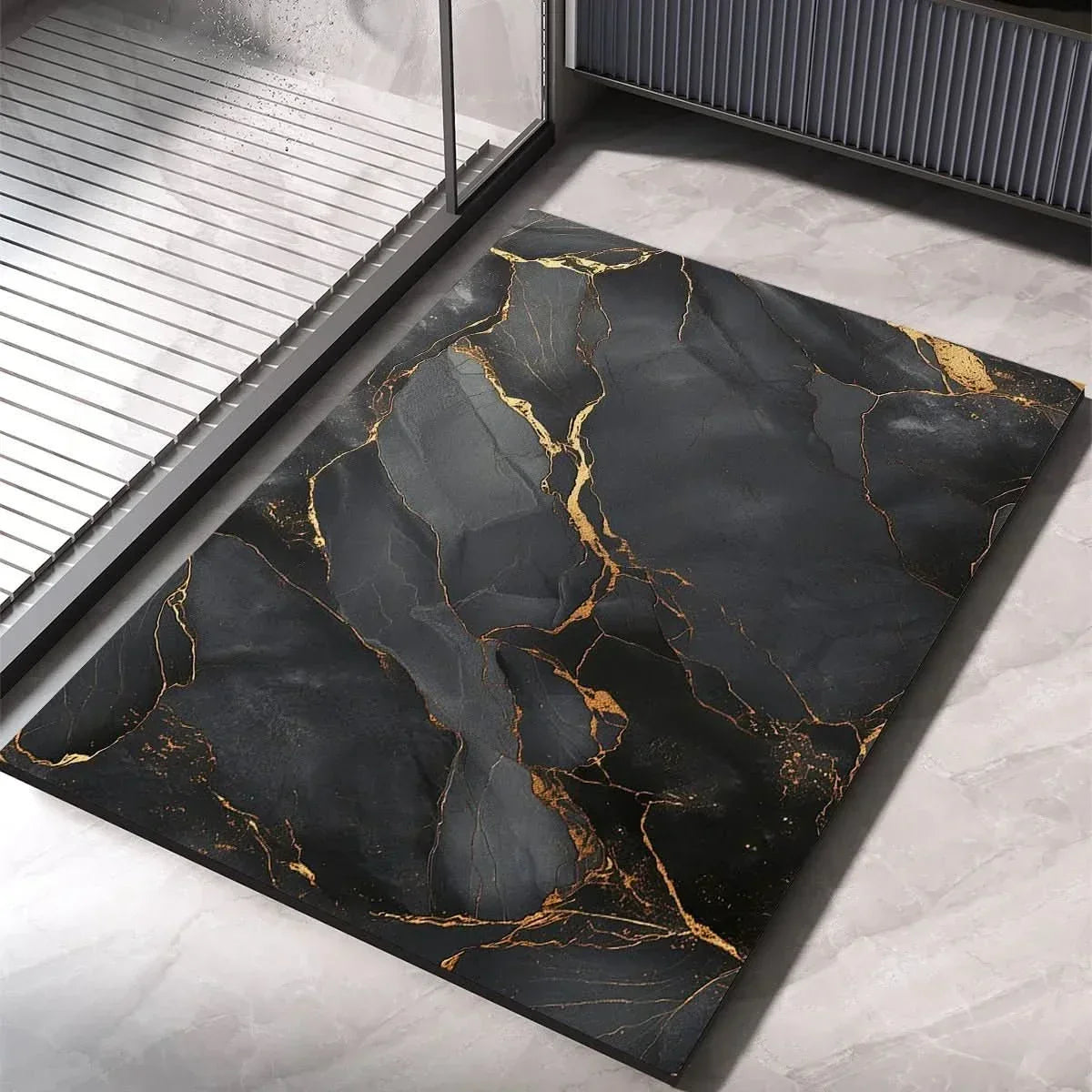 Diatomaceous earth bath mat with black base and gold marbled pattern