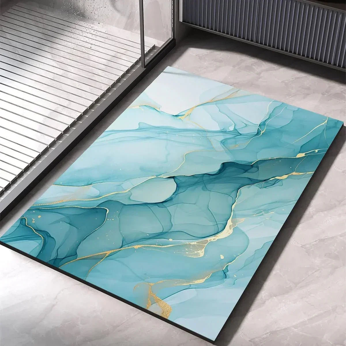 Blue bath mat with layered aqua marble pattern and gold vein accents, non-slip