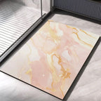 Light pink bath mat with gold and pale marble-vein pattern for shower, non-slip