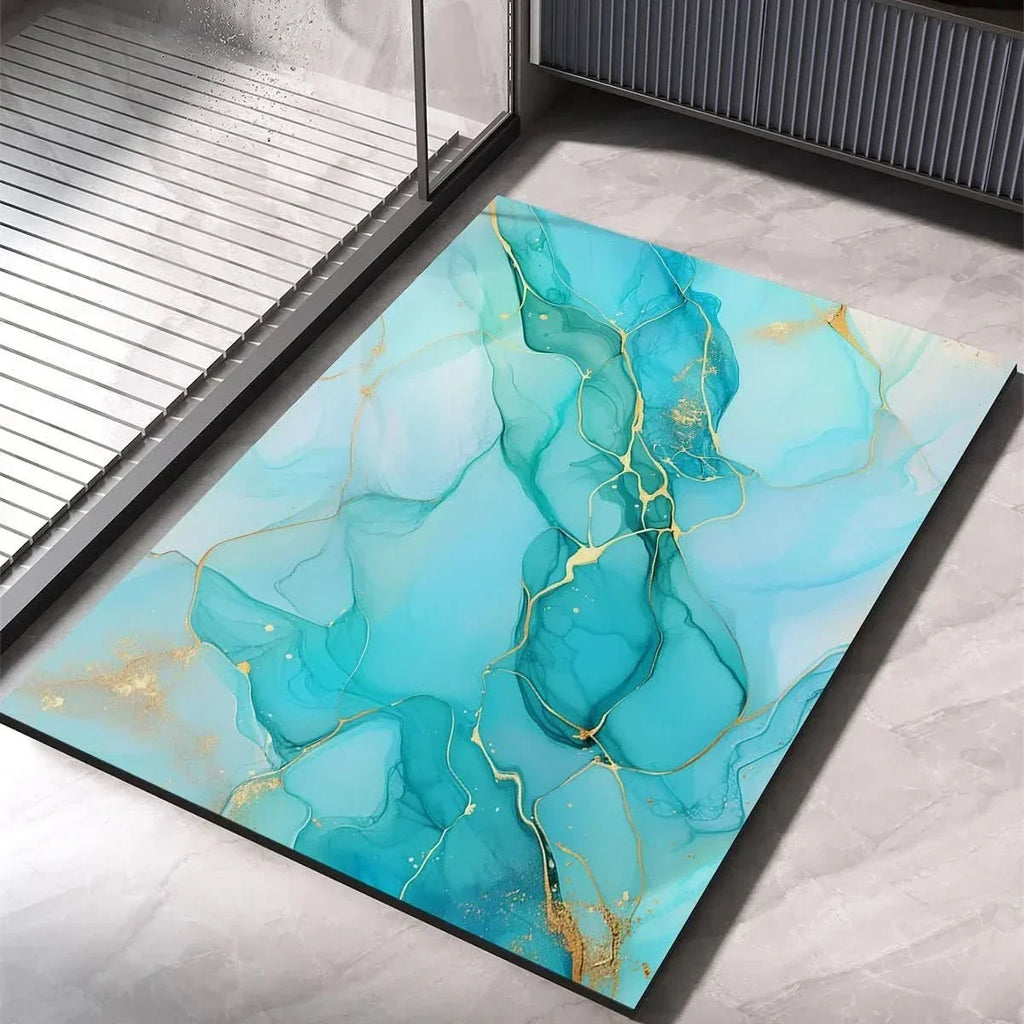 Aqua blue bath mat with teal marble veining and gold accents, non-slip quick-dry
