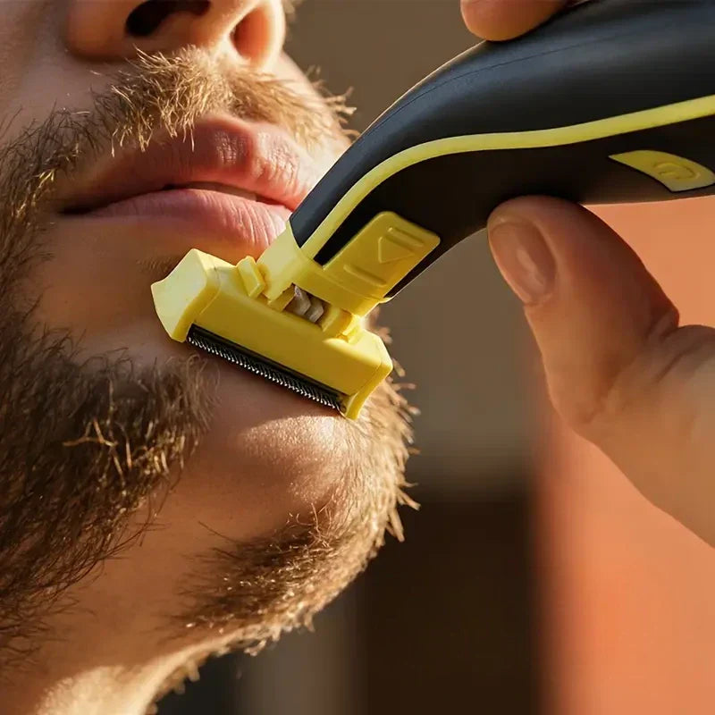 Electric shaver head shaving a man’s beard, black and yellow handheld razor