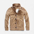 Khaki utility jacket with button-front, stand collar, and chest & waist pockets