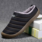 Men's lined slip-on slippers in black with faux-fur collar and grippy rubber sole