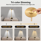 Cordless LED table lamp with slim stem and round top shade, touch dimming shown