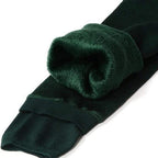 Fleece-lined winter leggings, deep green with plush green fleece cuff at the ankle
