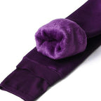 Fleece-lined winter leggings with plush purple interior, folded at the knee