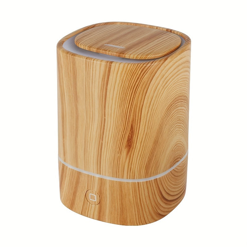 Orange woodgrain aromatherapy diffuser with top opening and base button