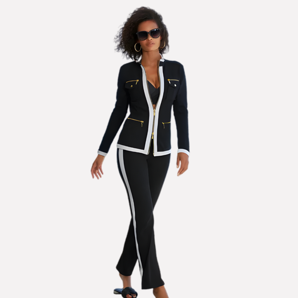 Black tracksuit set with zip-front jacket and flared pants, white contrast piping.