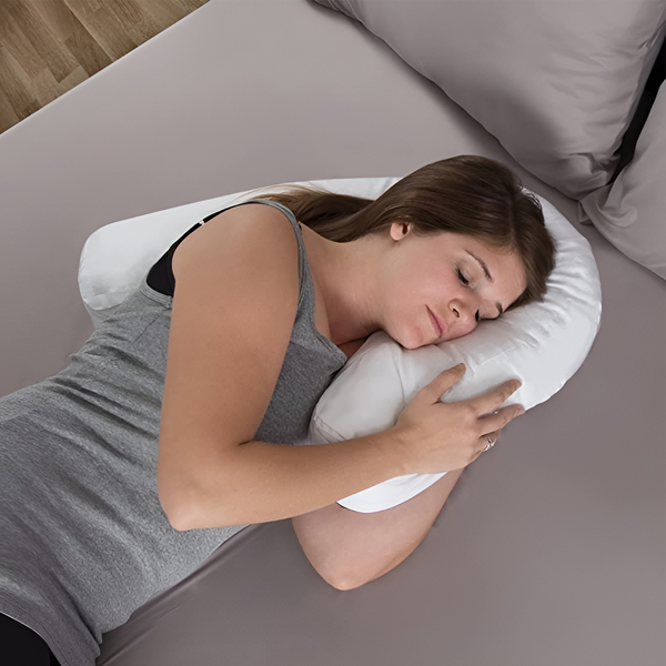 White long side sleeper pillow with ear cut-out, cradling head and neck on side