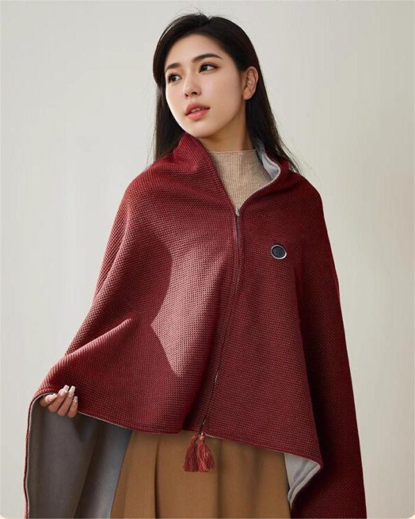 Red heated shawl wrap with zip front and tassel trim, USB power bank compatible