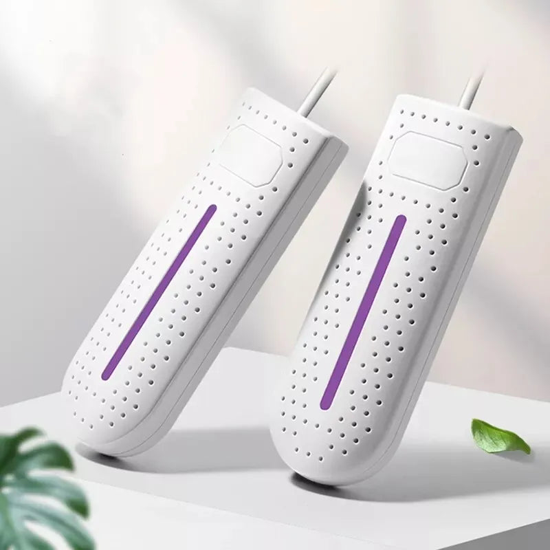 White electric shoe and boot dryer with vent holes and purple UV light bar