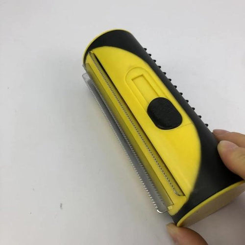 3-in-1 pet deshedding brush with yellow face and black rubber grip, comb teeth