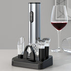 Rechargeable electric wine opener set on base with vacuum pump and pourer caps
