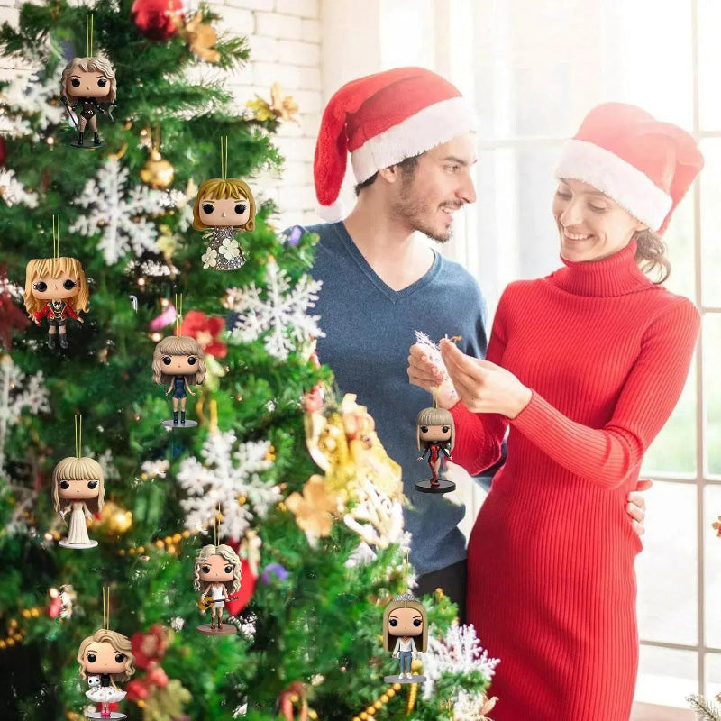Hanging pop star 2D charm figures on a decorated Christmas tree