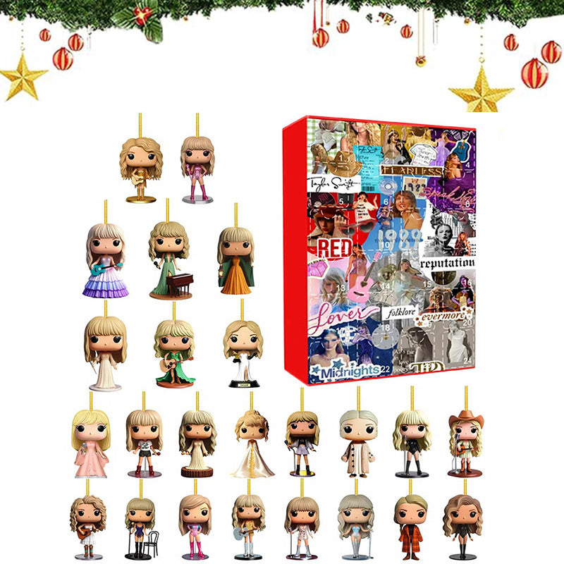 Assorted hanging pop star 2D charm figures with a red advent calendar box